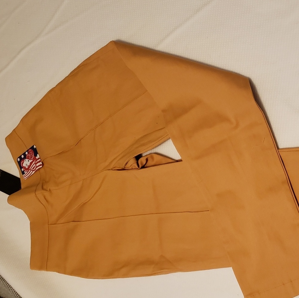 Laura Byrnes high waisted long trousers. Yellow